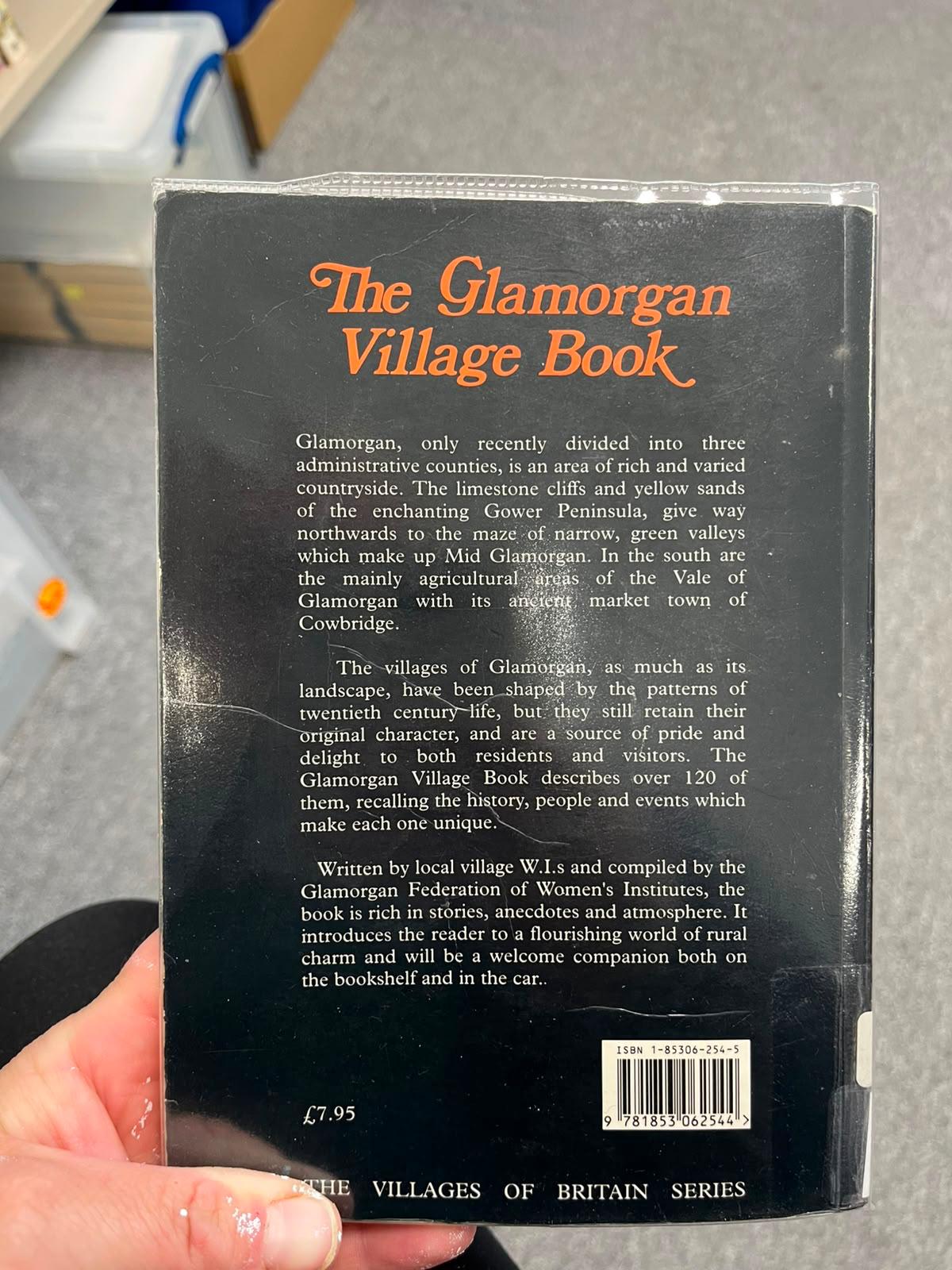 Photograph of the back cover of The Glamorgan Village Book, including its series information, price and ISBN.